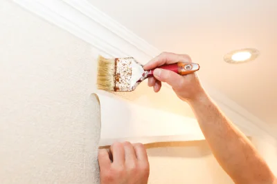 Pose de papier peint à Margut — revêtements muraux et toiles de verre